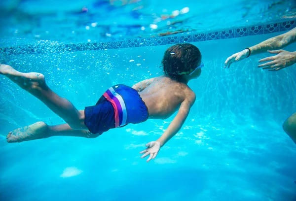 Young Diverse Boy Swimming Underwater Swimming Pool Learning Swim Help — Stock fotografie