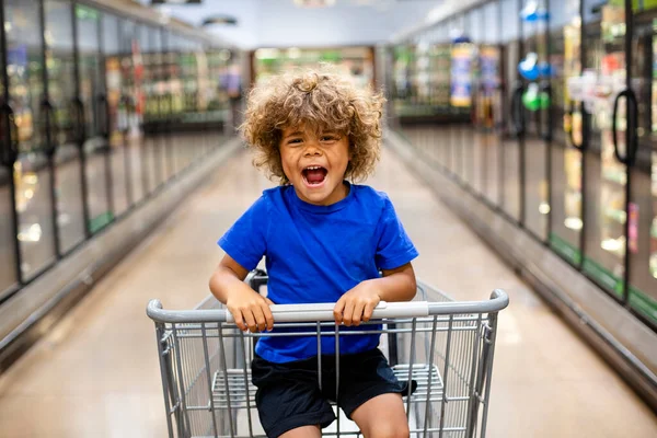 Funny Little Boy Laughing While Sitting Shopping Cart Family Trip — Stock Photo, Image