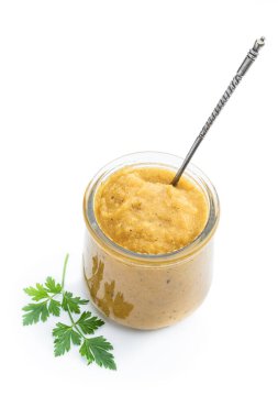 Vegetable  puree in a glass jar isolated on white 