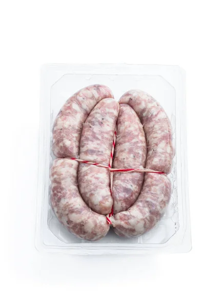 Rohe Schweinswürste Plastikverpackung Isoliert Auf Weißem Hintergrund — Stockfoto