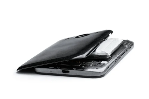 Smartfon Zniszczony Przez Eksplodującą Baterię Litową Izolowaną Białym — Zdjęcie stockowe