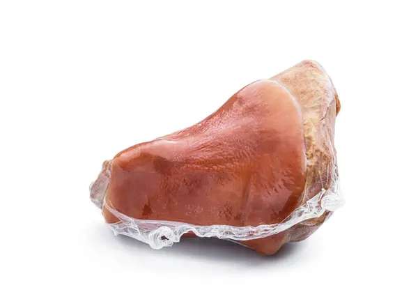 Gekochte Und Geräucherte Schweinshaxe Vakuumverpackung Isoliert Auf Weiß lizenzfreie Stockbilder