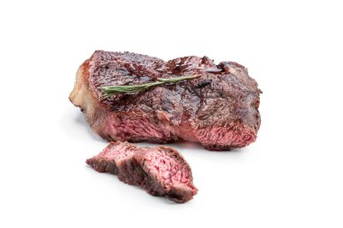 Kızarmış biftek ve beyaz otlar. 