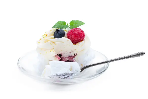 stock image Mini  Pavlova meringue nest with berries and whipped cream isolated on white 