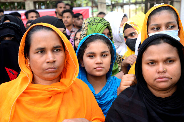 Garments workers of She and He Apparels limited stage a demonstration demanding their due three month salary in front of National press club in Dhaka, Bangladesh, on November 14, 2022