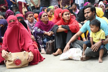 Garments workers of Achieve Fashion limited stage a demonstration in front Department of Labor building demanding reopen the garments factory in Dhaka, Bangladesh, on February 27, 2023