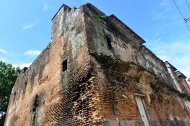 Panam şehrinin manzarasında, bir adam Bangladeş 'in başkenti Dhaka' nın Narayangong eteklerindeki haritada dua ediyor. 21 Haziran 2015 'te. Panam şehri, 19. yüzyılda başta Hindu kumaş tüccarları olmak üzere üst orta sınıf Bengalli işadamları tarafından inşa edildi.. 