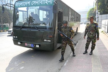 Bangladesh Army personnel stands guard at a makeshift camp at Bangabandhu Sheikh Mujib Medical University Medical Convention Center in Dhaka, Bangladesh, on January 3, 2024, to assist local administrations ahead of the upcoming general election on Ja