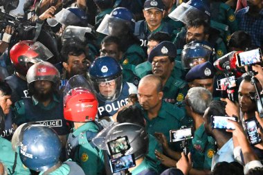 Bangladeshi former law minister Anisul Huq and former Prime Minister Sheikh Hasina's adviser Salman F Rahman (C, wearing police helmets and vests) are escorted to the Chief Metropolitan Magistrate (CMM) Court in Dhaka, Bangladesh, on August 14, 2024. clipart