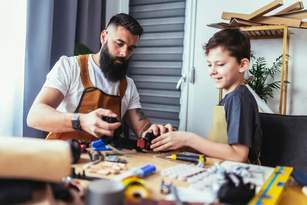 Father Son Making Furniture Wooden Plank Home — Stock Photo, Image