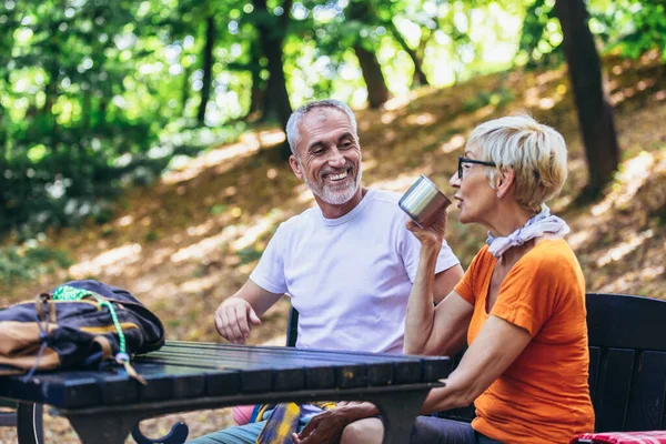 Mature Couple Sitting Drink Coffee Tea While Resting Forest Hiking —  Fotos de Stock