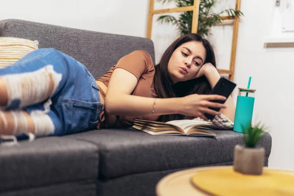 Stock image Happy teen girl using smartphone app enjoying online virtual chat video call with friends