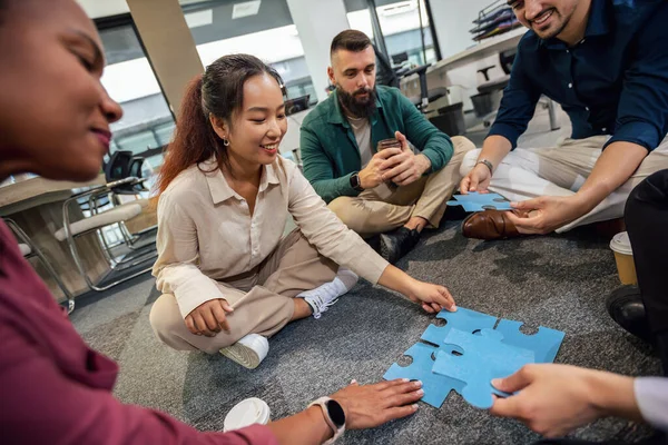 Group Professional People Playing Puzzle Floor Office Team Building — Stock Photo, Image