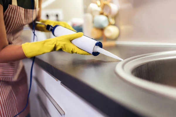 Woman Working Silicone Glue Caulking Kitchen — Stock Photo, Image