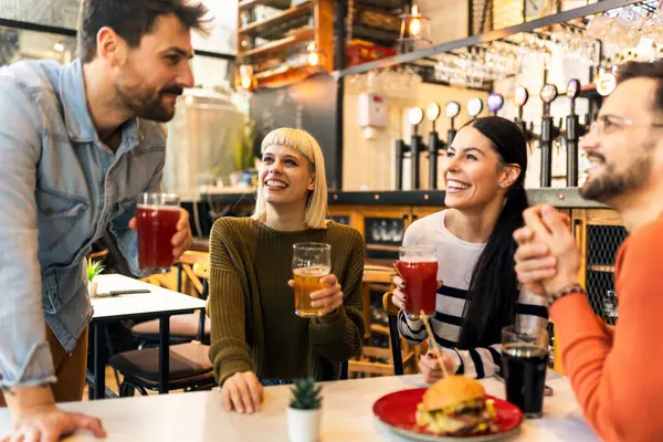 Smiling Young Friends Drinking Craft Beer Pub — Stock Photo, Image
