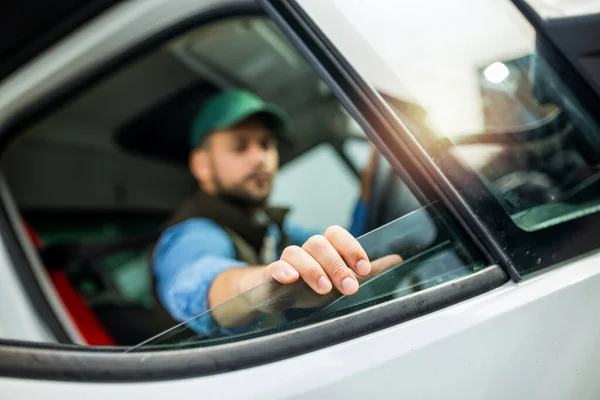 Young Truck Driver Rolls Window — Stock Photo, Image