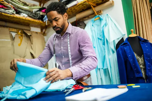 Male African American Tailor His Atelier Folding Fabric — Stock Photo, Image