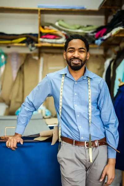 stock image Young African American tailor smiling in his own atelier.