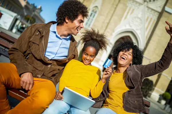 Family Sitting Bench Relaxing Using Digital Tablet Shopping Online — Stock Photo, Image