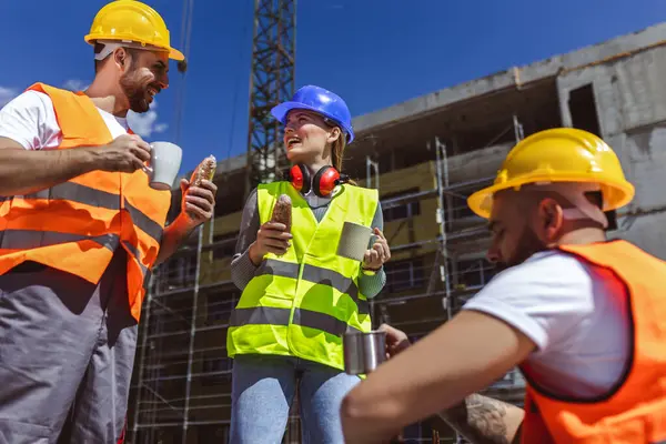 Three Constructions Workers Having Coffee Lunch Break Construction Site — Stockfoto
