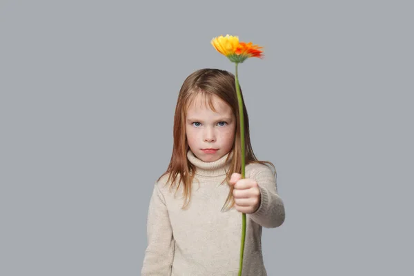 Funny little girl child with flower gift present on white banner background