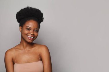 Cheerful lady posing on white background. Beautiful female face. Portrait of cute woman