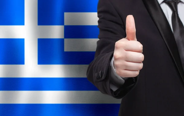 Греческая Концепция Бизнесмен Показывающий Большой Палец Фоне Флага Tgreece — стоковое фото