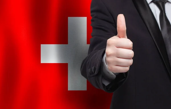 Schweiziskt Koncept Affärsman Visar Tummen Upp Bakgrunden Flaggan Schweiz — Stockfoto