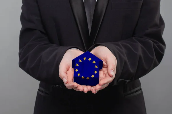 Person Holding Wooden House Flag European Union Finance Investment Mortgage — Stock Photo, Image