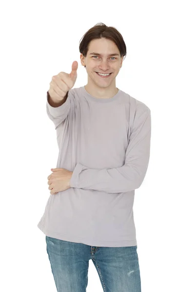 Szczęśliwy Uśmiechnięty Młody Człowiek Pokazując Kciuk Górę Odizolowany Białym Tle — Zdjęcie stockowe