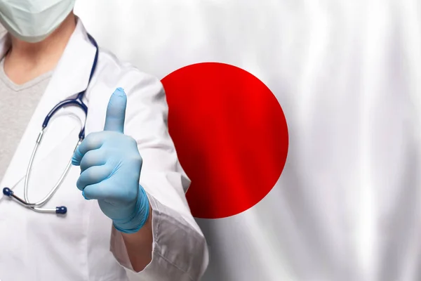 Japanese Doctor Hand Showing Thumb Positive Gesture Flag Japan Background — Stock Photo, Image