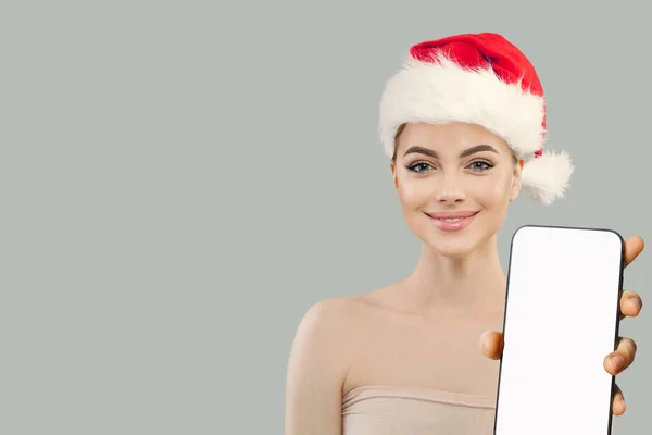 Χριστουγεννιάτικη Γυναίκα Χαρούμενο Μοντέλο Santa Δείχνει Smartphone Κενή Οθόνη Λευκό — Φωτογραφία Αρχείου