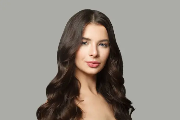 Beautiful Brunette Model Woman Long Wavy Hair Shiny Fresh Skin Royalty Free Stock Images