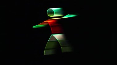 Neon çubuklardan yapılmış çok renkli parlak takım elbiseli komik dans. Hareket İzi Efektiyle Çekim