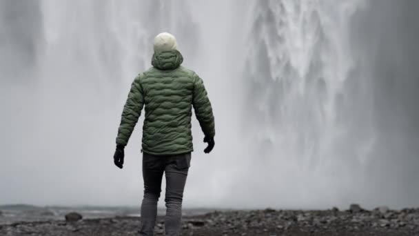 Man Walking Waterfall Flowing Scale — Stock Video