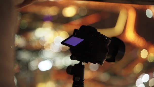 Close Shot Focusing Camera Tripod Window View City Lights — Stock Video