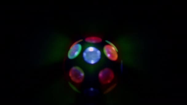 Gloeiend Draaiend Disco Lichten Buiten Focus — Stockvideo
