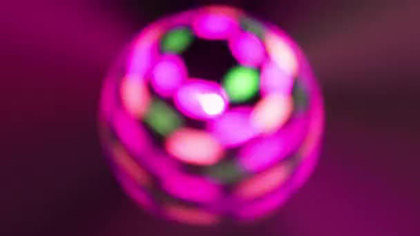 Pink Spinning Disco Ball Glowing — стокове відео