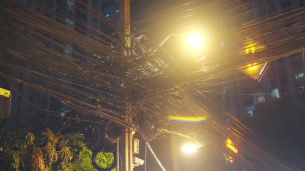 Video Showing Tangled Wire Lines Electrical Post Illuminated Warm White — Vídeo de stock