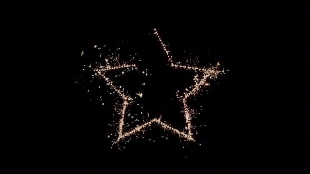 Sparklers Burning Brightly Forming Five Pointed Star Dark Background — Vídeo de Stock