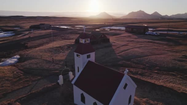 Arc Shot Showing Modrudalur Church Red Roof Field Daytime Iceland — ストック動画