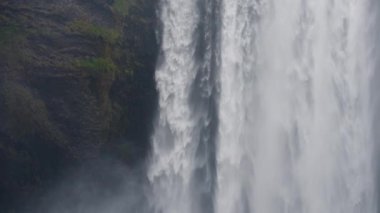 A video showing a close-up shot of the Skogafoss waterfall located in Iceland
