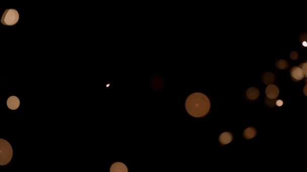 Blurred Bokeh Lighting Effects Burning Sparklers Scattering Left Right Side — Stockvideo
