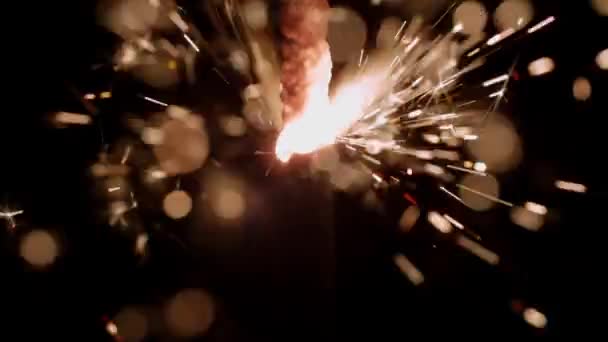 Close Shot Sparkler Stick Burning Bokeh Lighting Effects Slow Motion — Vídeo de stock