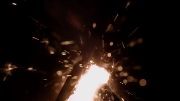 Two Sparklers Burning Middle Slow Motion Dark Background — Video Stock