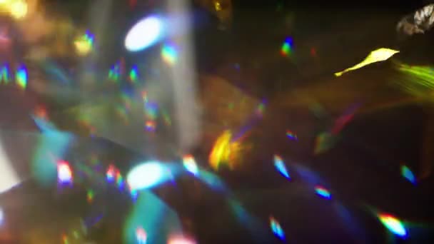 Glowing Confetti Lens Flare Effect Falling Black Background — Wideo stockowe