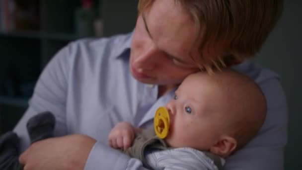 Father Cuddling Baby Boy Son — Stock Video