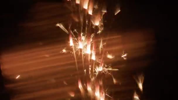 Five Sparklers Burning Vertically Emitting Blurry Golden Light Effects Dark — Stock Video