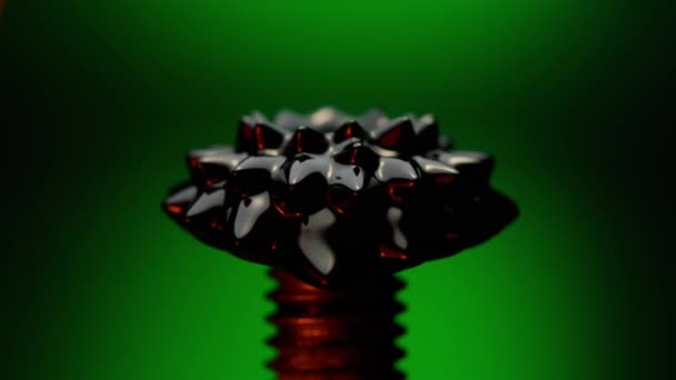 Ferrofluid Grön Bakgrund Spinning Närvaro Ett Magnetfält — Stockvideo