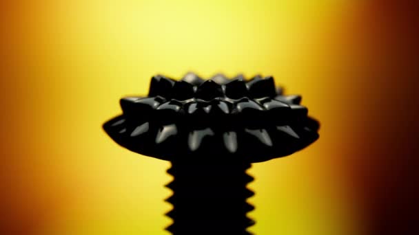 Černá Feromagnetická Kapalina Žlutém Gradientu Pozadí Rotující Vpravo Přítomnosti Magnetického — Stock video